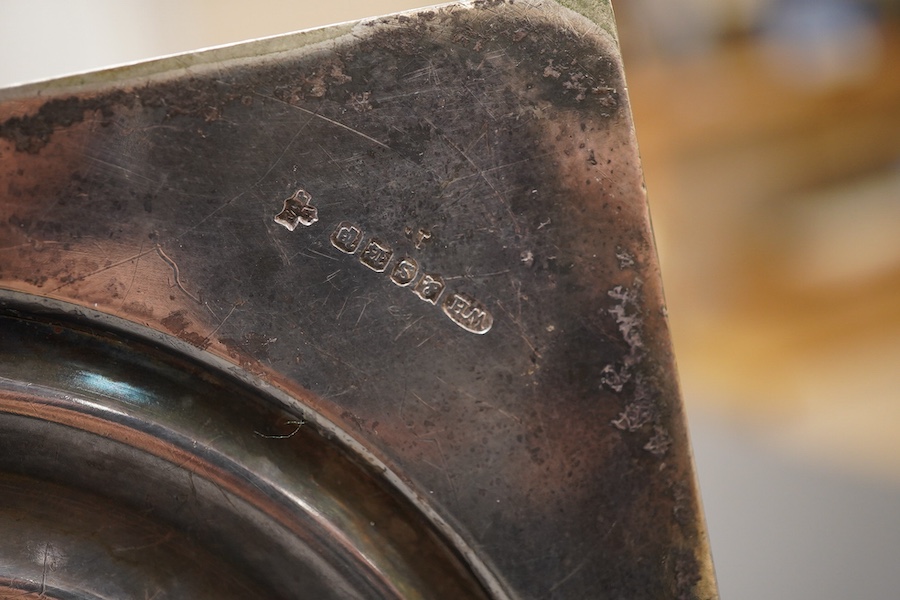 A garniture of 19th century silver plated Corinthian column candelabra, comprising a pair of two branch, three light candelabra and matching four branch, five light candelabrum, with detachable acanthus leaf capped scrol